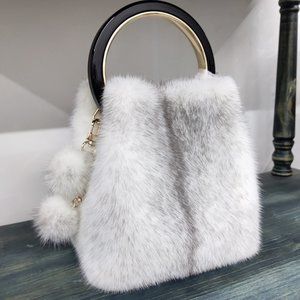 Leather straw bag with leather bucket bag bracelet